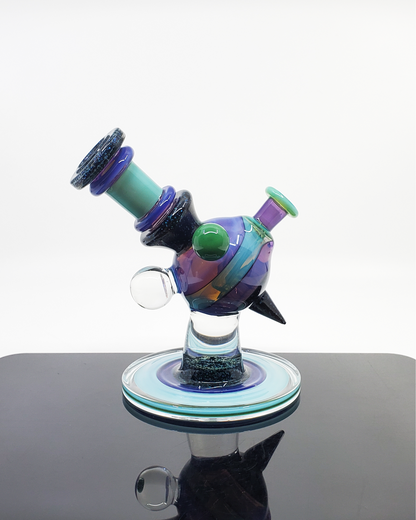 Two-Tone Crushed Opal Heliosphere 14mm Rig: The Cajun Glass limited edition rig combines striking opal detailing with a clean two-tone finish and a 14mm joint, a must-have for collectors seeking art and function.