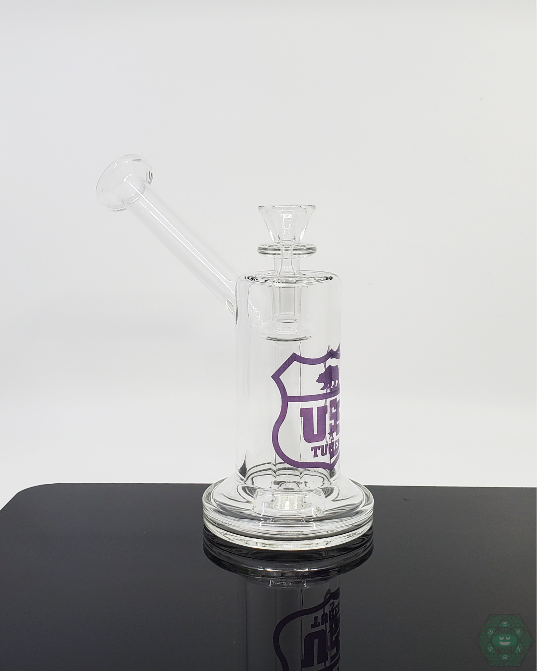 US Tubes 7-inch Mini Bubbler, designed for durability and portability, providing smooth hits in a compact form for easy filtration