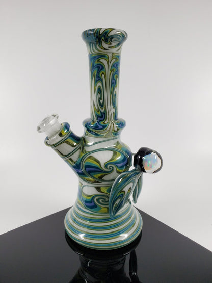 10MM Joint Mini Tube in White and Green by A.H. Glass. This compact and stylish tube is perfect for on-the-go smoking.