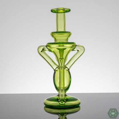  10mm Dual Uptake Recycler: This M Henny recycler is designed with dual uptake and a 10mm joint for optimal filtration and smooth hits.