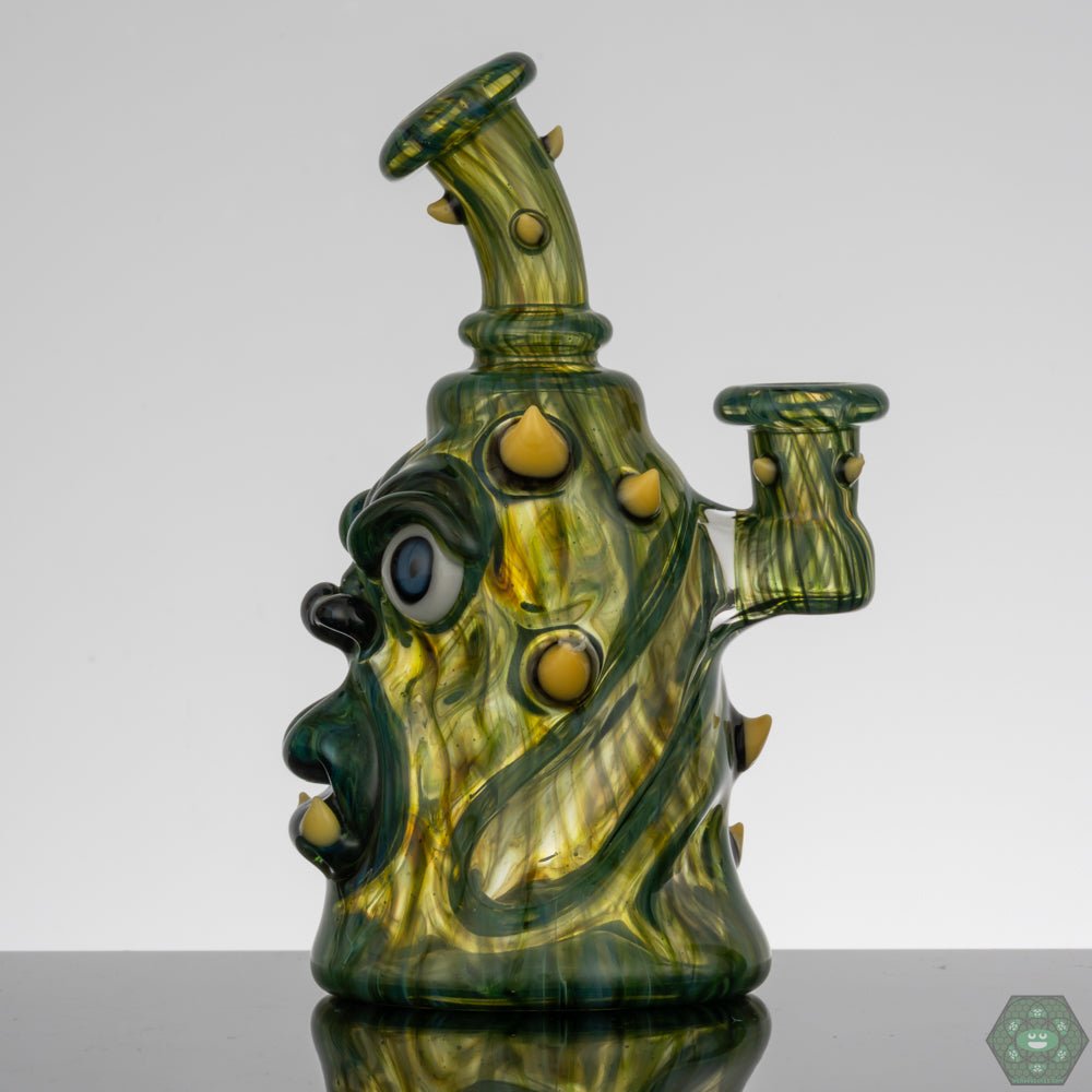 10mm Glass Rig with Gil Perc: This Kaleb Folck rig features a 10mm female joint and a single-hole gil percolator for smooth and efficient filtration