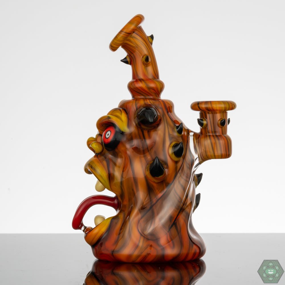 10mm Glass Rig with Gil Perc: This Kaleb Folck rig features a 10mm female joint and a single-hole gil percolator for smooth and efficient filtratioN