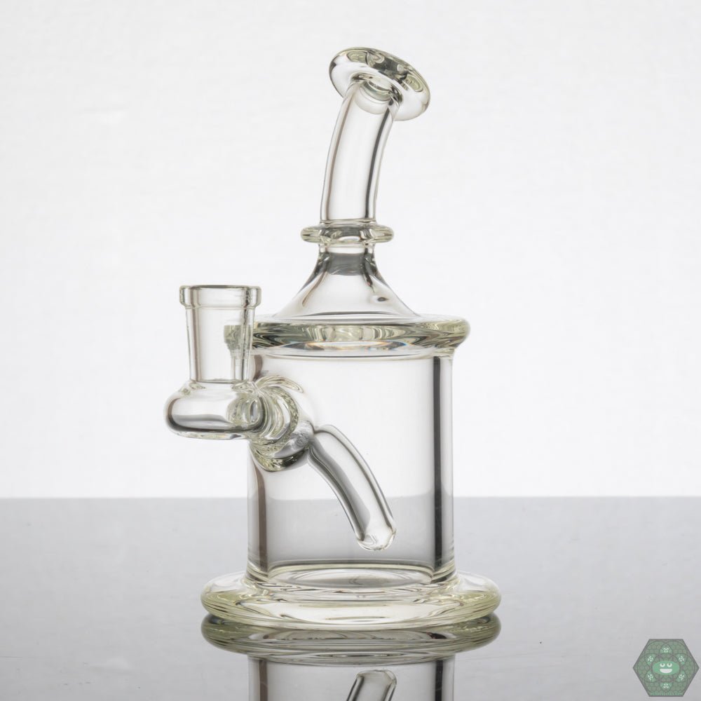 Portable 7 Ten Glass Clear Mini Tube with 10mm joint, ideal for easy storage and transport.

