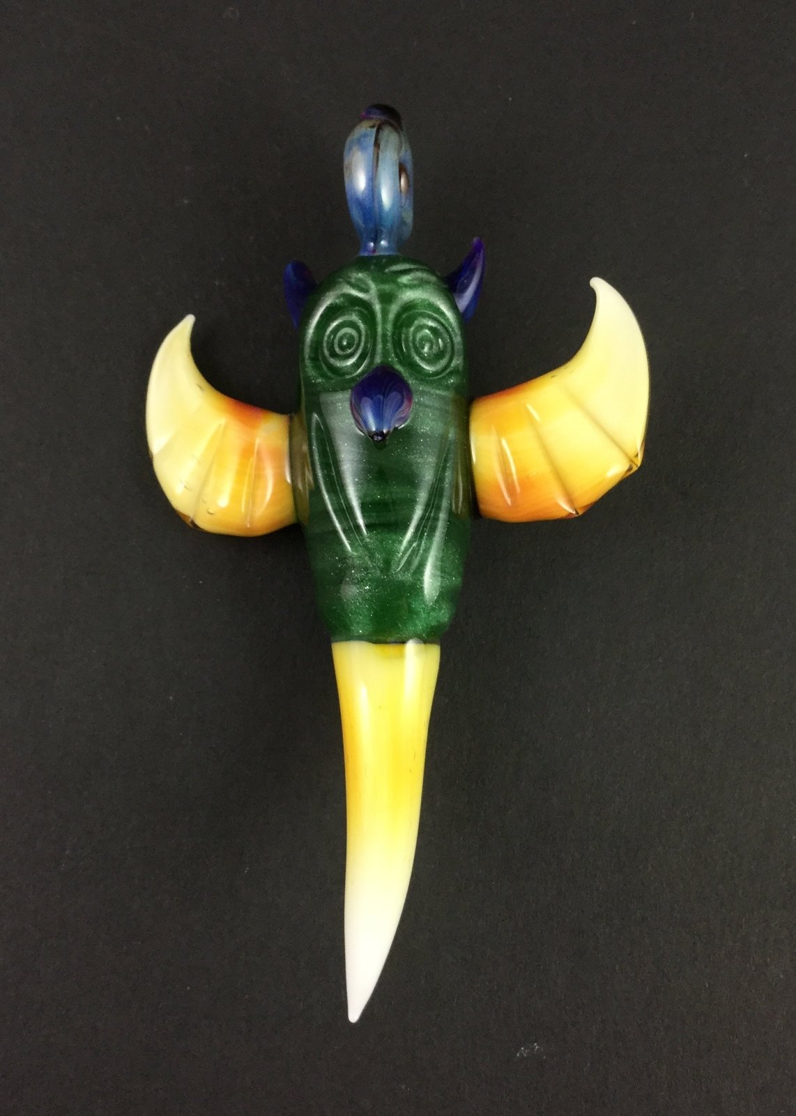  Bearclaw Owl Pendant - Handcrafted Glass Pendant with Owl Design. This pendant showcases intricate glasswork, featuring a detailed owl design.