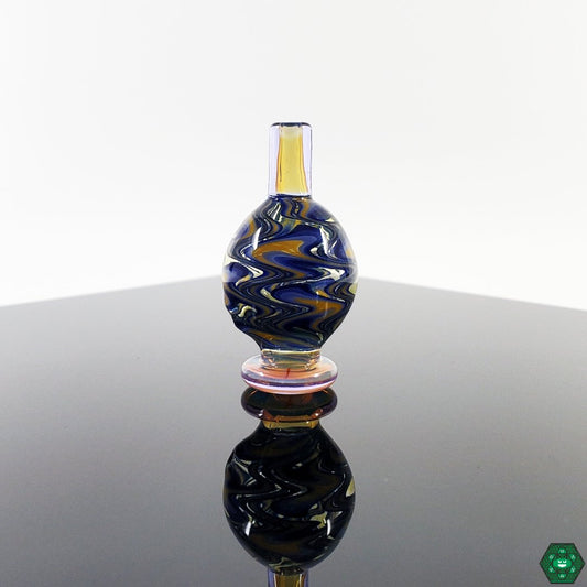  Bhomb Bhomb Glass Bubble Caps – Stylish Wig-Wag Design for Smooth Airflow. Color Options: Fume and Ether. Designed to fit 25MM quartz nails.