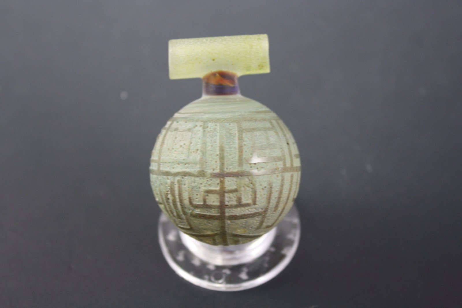 Durable Utility Tool - Bearclaw Space Key 4. Made with high-grade materials for reliability. Sleek, space-themed design.