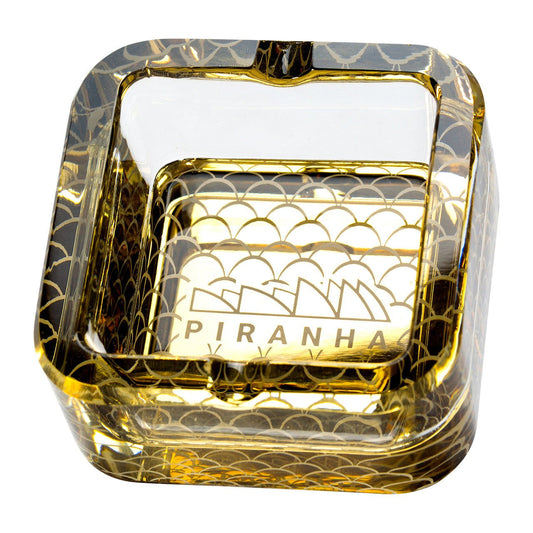 Piranha Cube Glass Ashtray, a compact and modern minimalist ashtray crafted from premium glass, perfect for any setting.