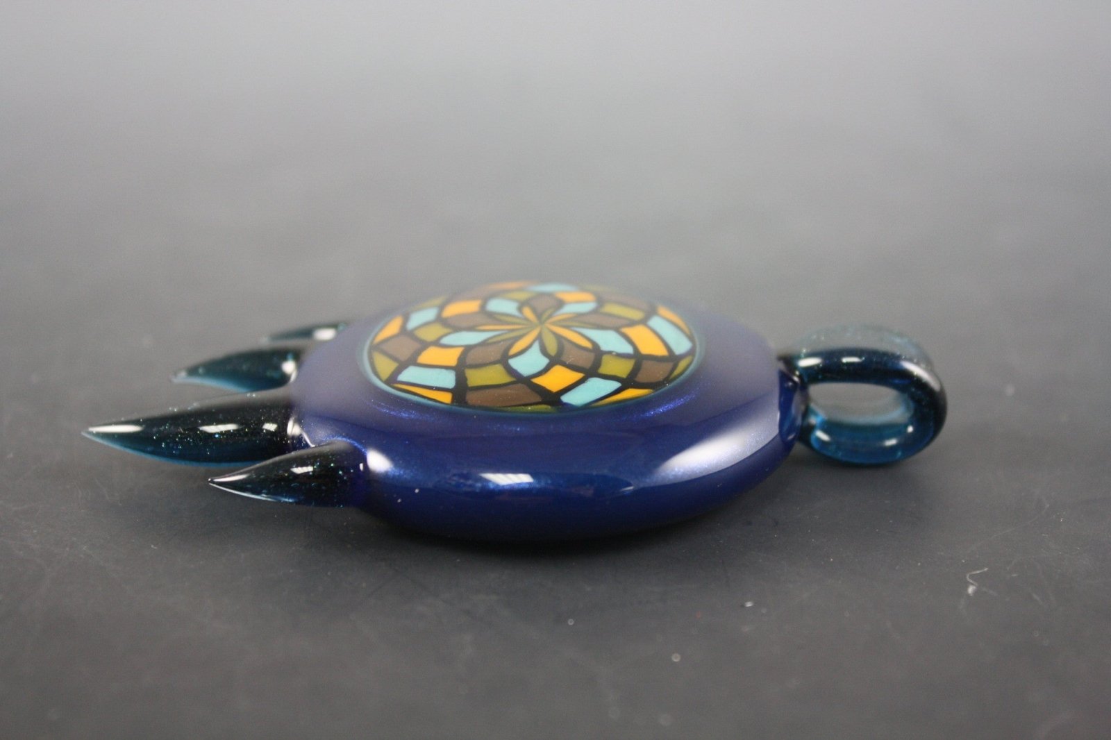 Handcrafted Glass Pendant - Bearclaw Filla #3.  Discover the intricate craftsmanship of this exclusive, limited-edition pendant.