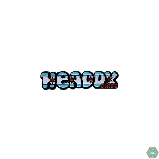 The Headdy Glass Hexagon Hat Pin is a unique and stylish collectible piece that adds a touch of geometric flair to any outfit. Its durable enamel construction ensures it will last for years to come.