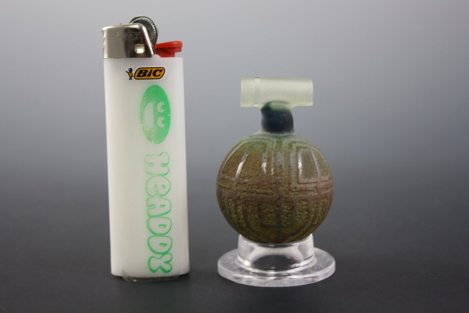 Multi-Function Smoking Tool - Bearclaw Space Key 3. Uniquely crafted space key design for versatile use.