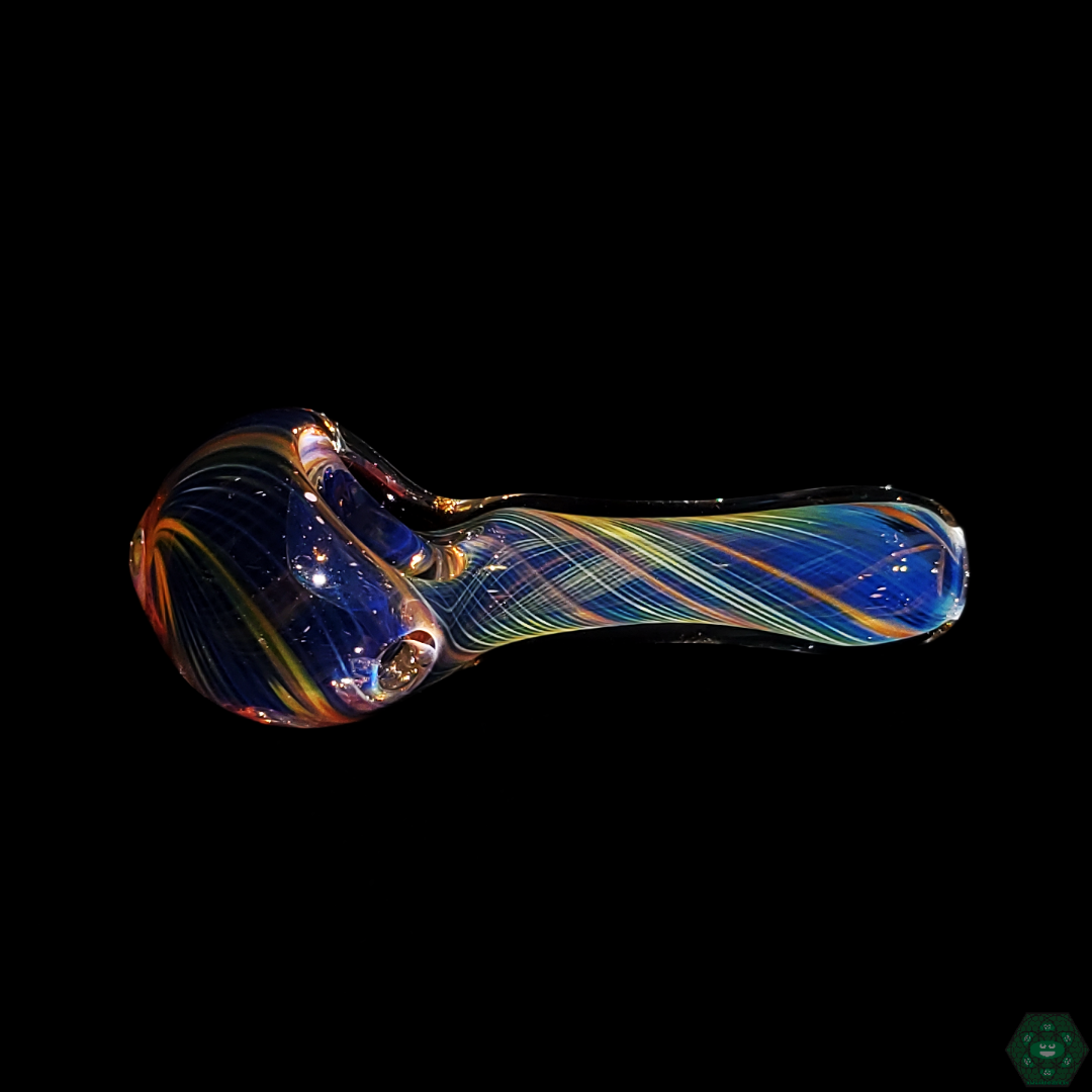 STF Glass Fumed Spoons - High-Quality Glass Pipes with Unique Fumed Patterns.