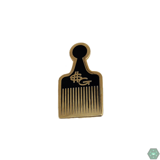 The Slum Gold Hair Pick Comb Pin is an iconic and stylish enamel pin that adds a touch of luxury to any collection. Its unique design and durable enamel make it a standout piece for style enthusiasts.
