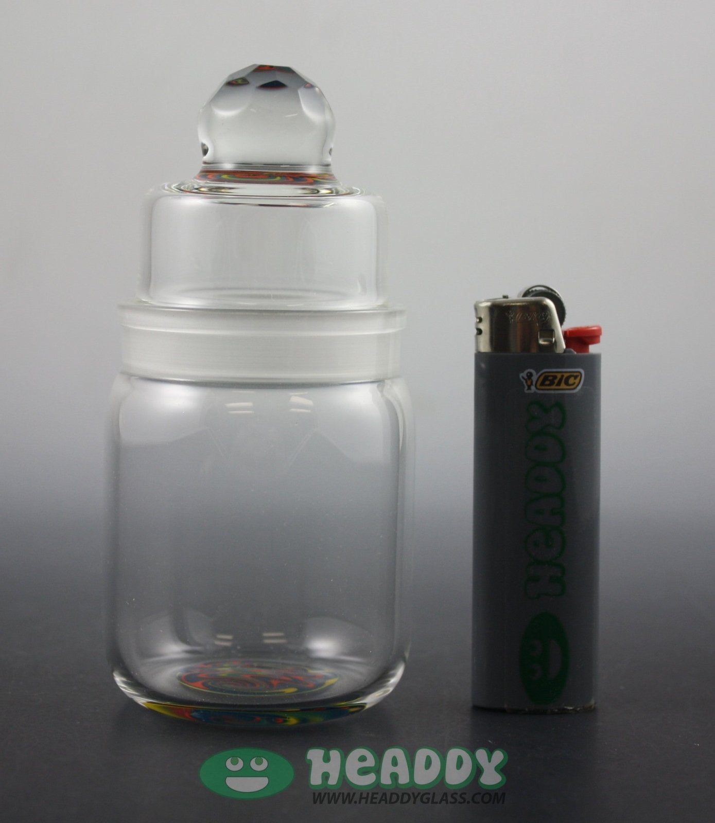  Unique Q-tip Holder by Andy G. This faceted top glass jar is a unique and stylish addition to any dab station. Features a glass-on-glass fitting for durability.