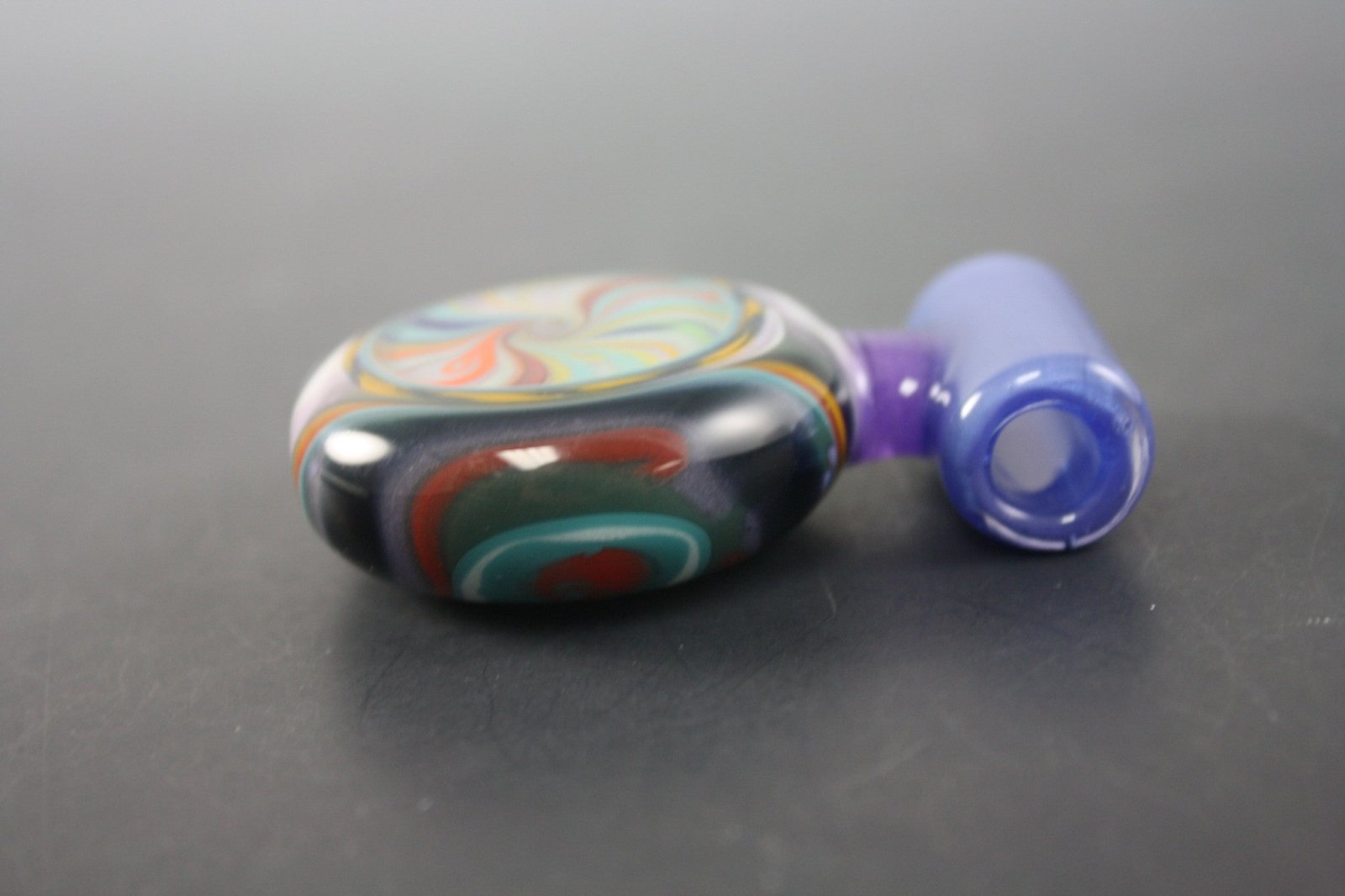  AAA Glass Coogi Pendant #1, an artistic glass jewelry piece with vibrant colors.
