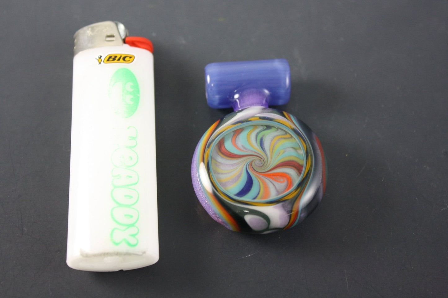 AAA Glass Coogi Pendant #1, a collectible art piece featuring colorful glass design.