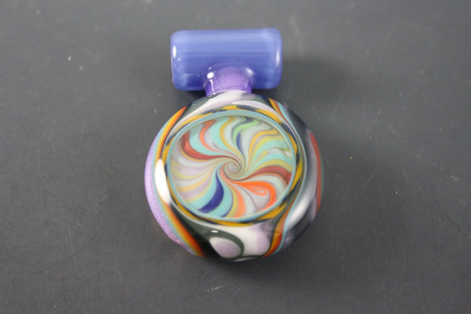 AAA Glass Coogi Pendant #1 with intricate glass detailing and colorful design.