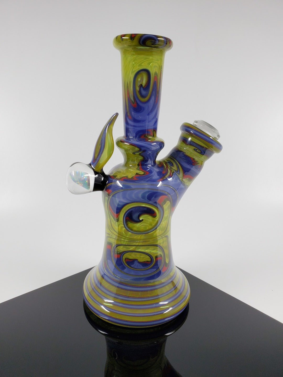 A.H. Glass Green Red Mini Tube with sturdy 10mm joint for smooth sessions.