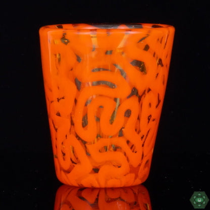 Orange Brain Tech Shot Glass by Algae Glass, a handcrafted, collectible art glass piece featuring intricate brain-like patterns, blending art and utility, perfect for collectors or as a standout piece, each shot glass is unique due to its handcrafted nature.