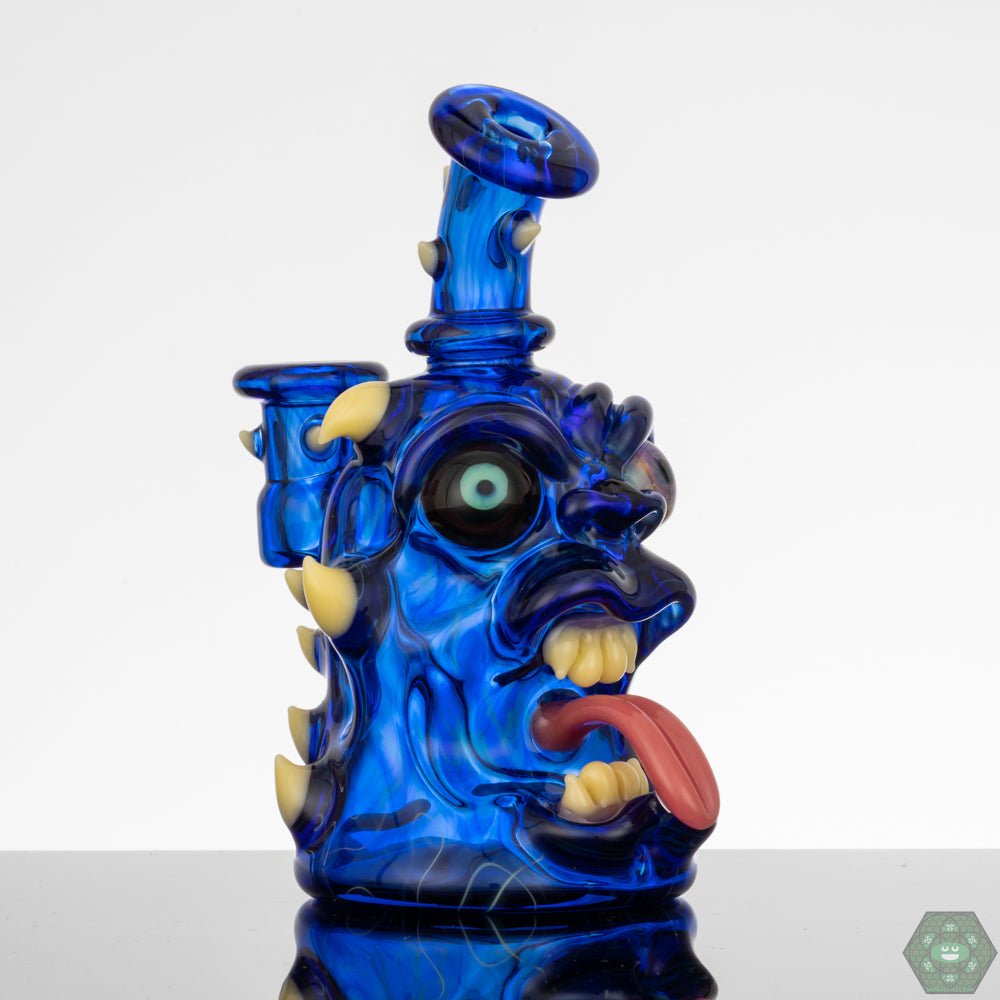Artisanal Glass Rig with Bubble Cap: The Kaleb Folck GPPR Open Mouth #337 includes a matching bubble cap, completing the setup and enhancing the dabbing experience.