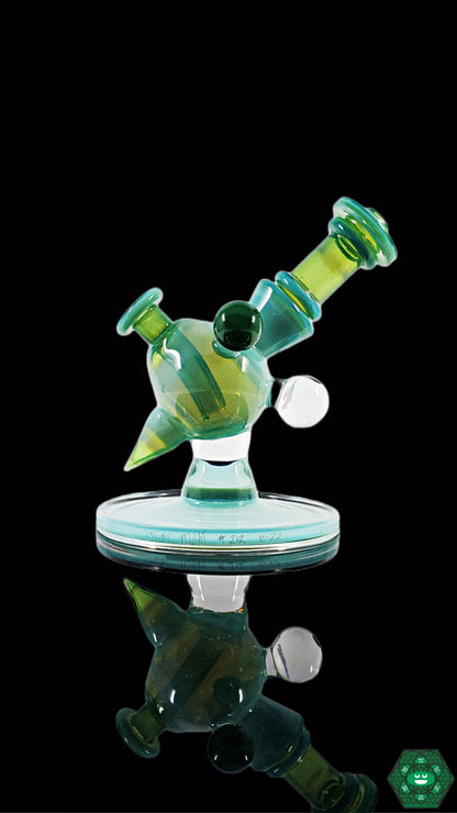 Cajun Glass Full-Color Heliosphere, a vibrant and unique glass piece featuring a two-hole percolator for smooth hits and enhanced filtration, perfect for enthusiasts looking to elevate their session.