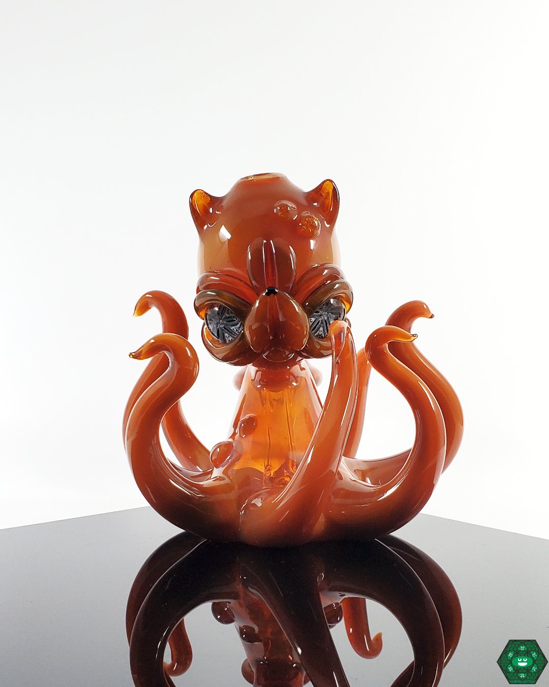 Casto Glass Octoblickey, a marine-inspired masterpiece featuring intricate octopus details, a heady glass rig combining beauty and function with a 10mm joint for smooth hits, a collector’s choice for enthusiasts who appreciate artistry.