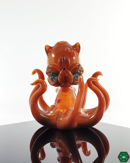 Casto Glass Octoblickey, a marine-inspired masterpiece featuring intricate octopus details, a heady glass rig combining beauty and function with a 10mm joint for smooth hits, a collector’s choice for enthusiasts who appreciate artistry.