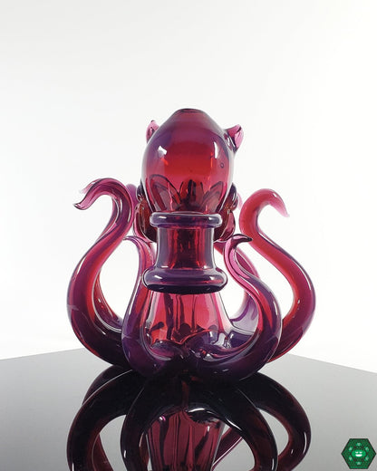 Casto Glass Octoblickey #2: Close-up showcasing the stunning royal jelly and glopal eyes UV colors and intricate details of this 14mm heady glass rig.