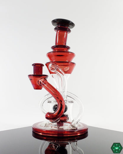 Cerio Glass Phoenix V2 Double Recycler, a top-tier recycler featuring dual uptake and a 4-hole perc for exceptional filtration and smooth pulls, a must-have for collectors seeking top-tier performance and design.