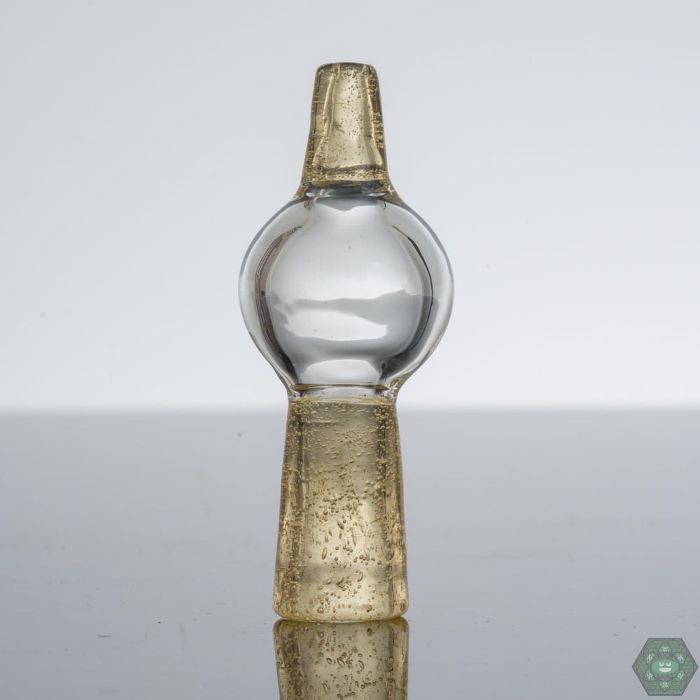 CFL Reactive Bubble Caps: Kayo Glass offers CFL-reactive bubble caps in Syzygy and Sunset Slyme, changing color under compact fluorescent light.