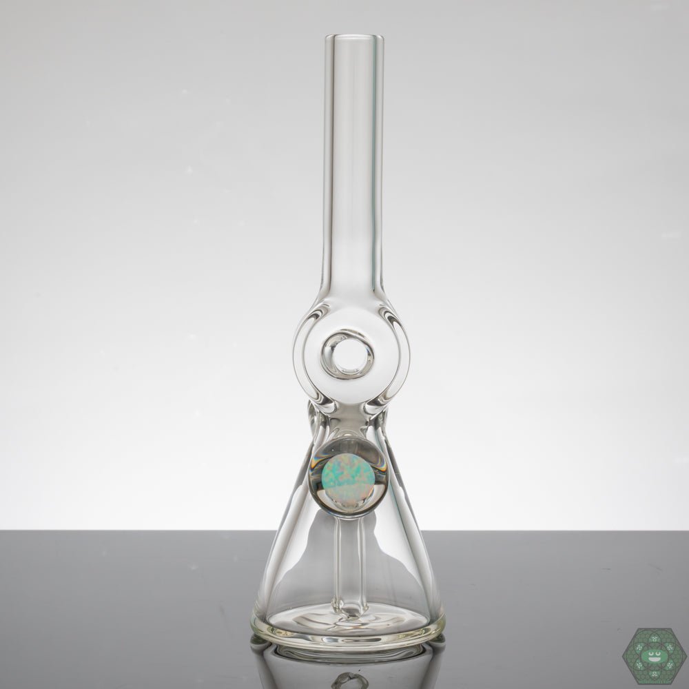 Clear Donut Tube with Opal Inlay: The Gemini Glass Clear Donut Tube #2 features a beautiful opal inlay, adding a touch of elegance to this compact and functional piece.


