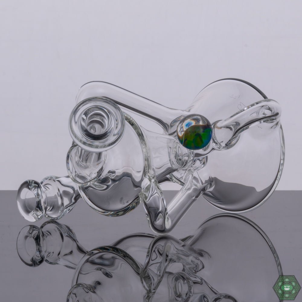 Clear Glass Dab Rig: The Torch D Boro Clear Mini Klein features a sleek, clear glass design that highlights the intricate workings of the recycler.