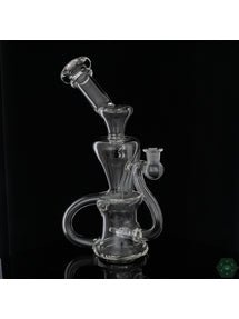 Clear Glass Recycler: The Curse Glass Clear Recycler offers efficient filtration in a clean and minimalist design, perfect for enjoying smooth and flavorful hits.


