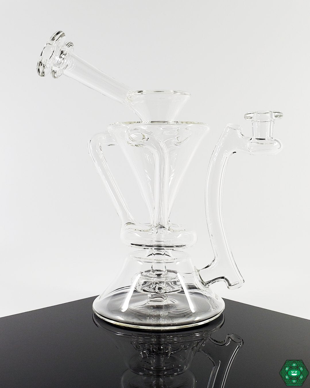 Clear Internal Recycler #2: The McGrew Glass Clear Internal Recycler, offering smooth hits and exceptional airflow in a high-quality glass design, ideal for connoisseurs who value functional design.