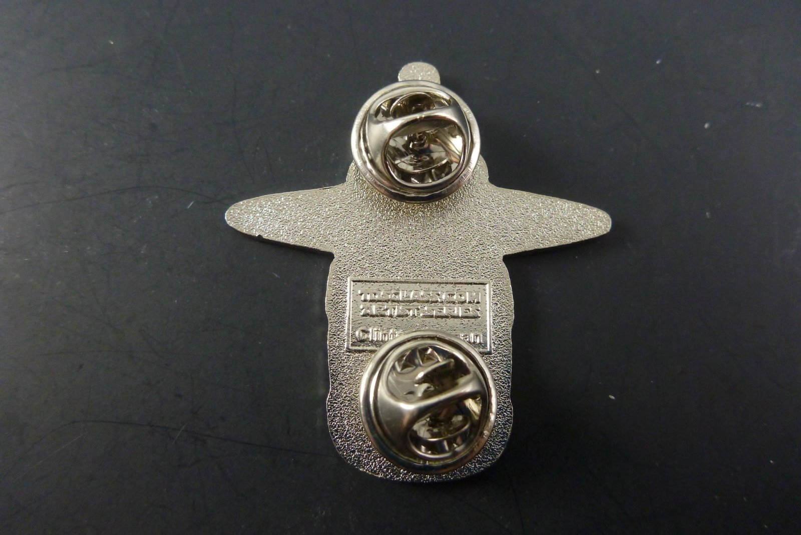 Close-up of Clinton Kachina Pin, showcasing intricate details and craftsmanship, making it a standout piece in any collection of cultural art.