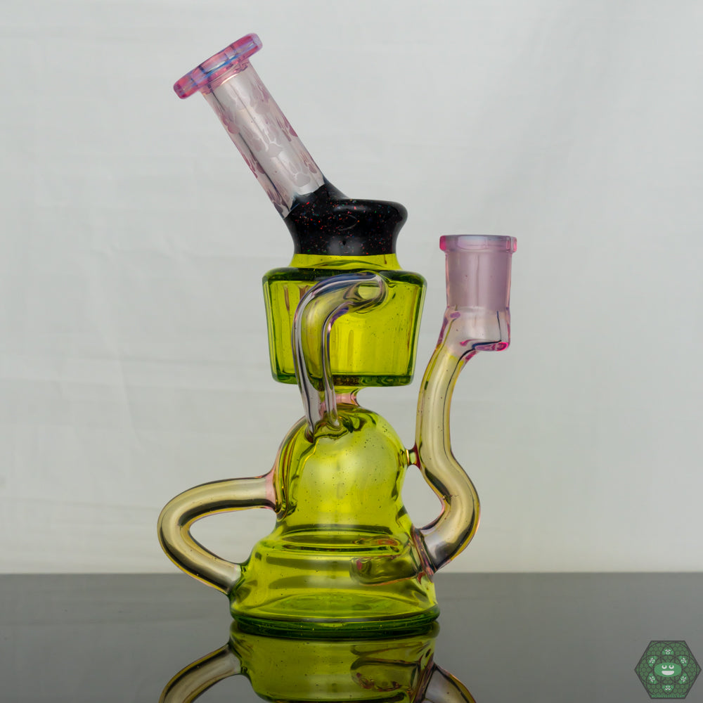 Collector's Dab Rig: The Wolfe Glass Double Single External Drain Recycler is a highly collectible piece for enthusiasts who appreciate functional art.