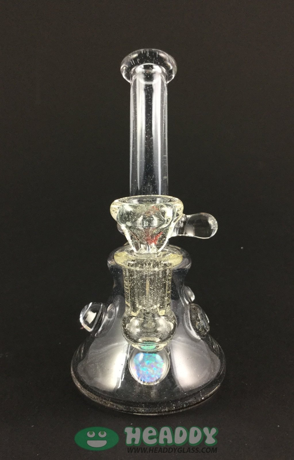 Crux Glass Minitube #4, both functional and decorative, offering an artistic touch to any glass collection.