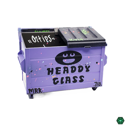 Dab Dumpsters with Headdy Logo in hand, demonstrating its compact size and easy portability for dabbers on the go.