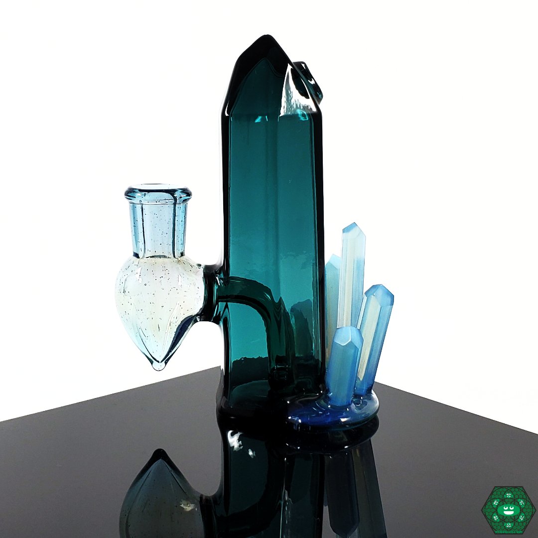 Digger Glass Lil Cutie Crystal Cluster Rig – 5.25-inch height, featuring 2-hole perc design and striking Indicolite Teal crystal cluster for enhanced filtration.
