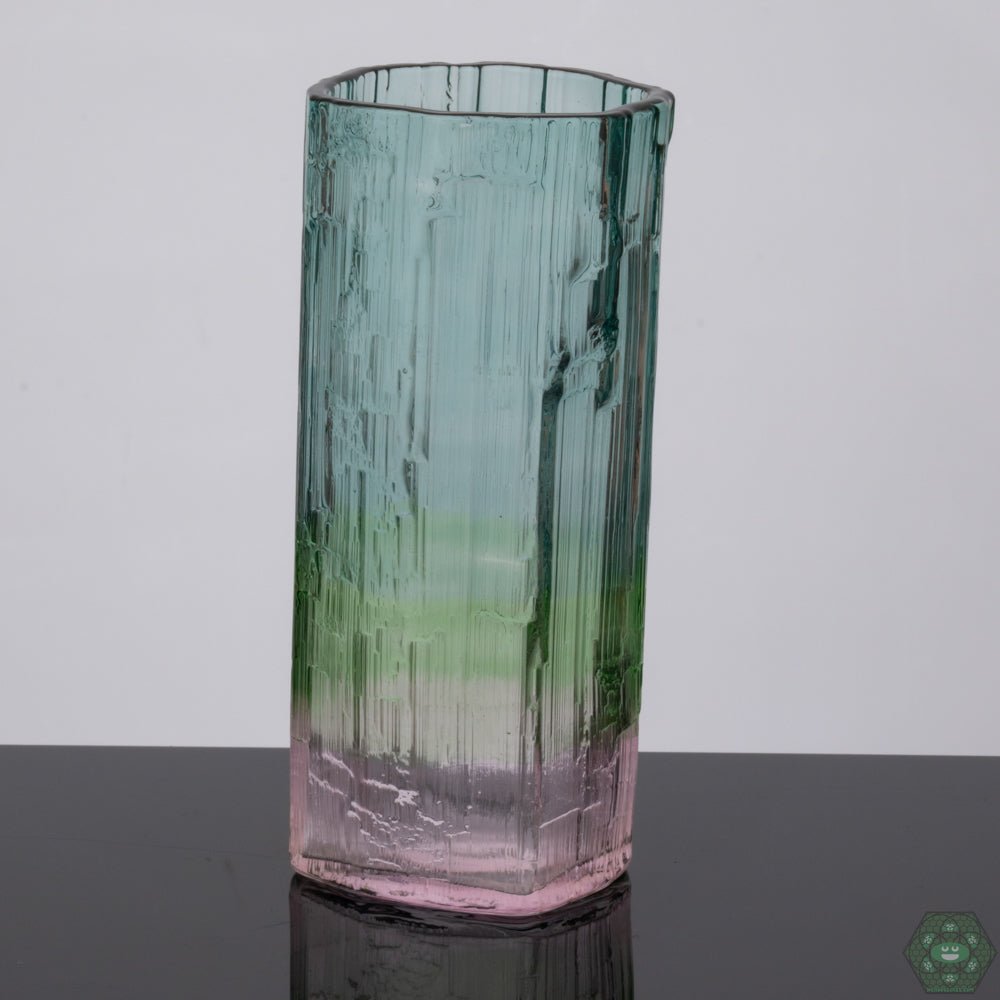 Digger Glass Tall Glass, an elegant handcrafted drinking glass combining functionality with artistry, perfect for any occasion, crafted with attention to detail to enhance your drinking experience while serving as a beautiful centerpiece for your table.