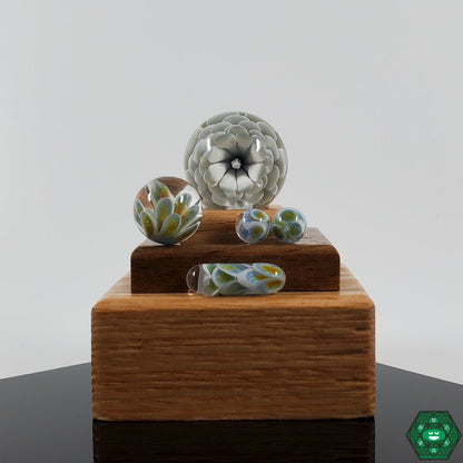 Divleli Glass Slurper Set with marble and terp pearls, designed to enhance flavor retention in dabs.