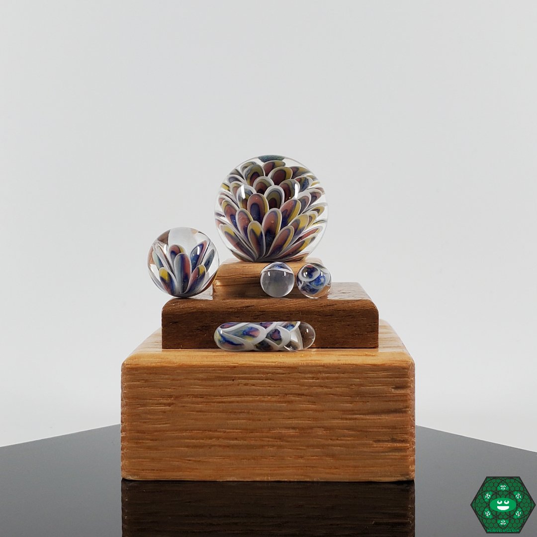 Divleli Glass Slurper Set, equipped with marble and terp pearls for perfect airflow control during dabbing.