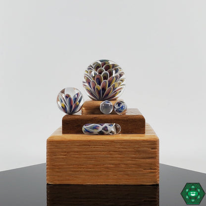 Divleli Glass Slurper Set, equipped with marble and terp pearls for perfect airflow control during dabbing.