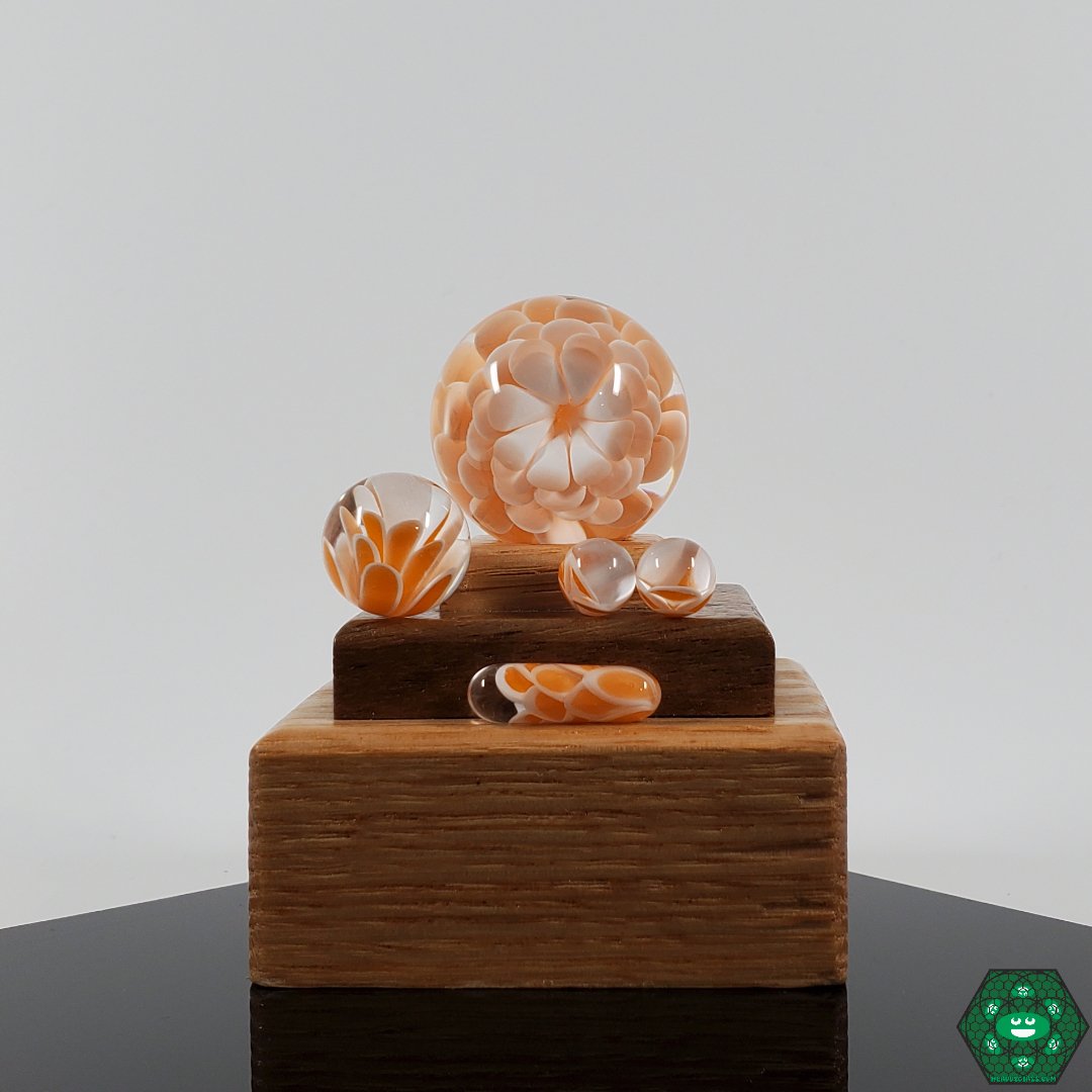 Divleli Glass Slurper Set with marble, terp pearls, and a complete dab kit for optimal hits.