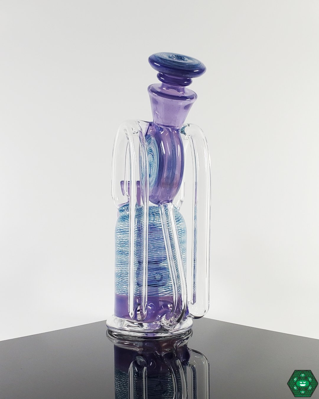 Double Vertical Recycler: The Cerio Glass Double Vertical Recycler, designed for enhanced airflow and smooth hits with its unique double vertical structure.