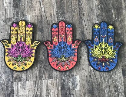 East Coasters Die Cut Hamsa 10" Dab Mat, an artistic and protective mat for rigs, Hamsa-inspired design adding a cultural touch, 10-inch die-cut design combining heat resistance and non-slip durability, a reliable mat for dabbing accessories.