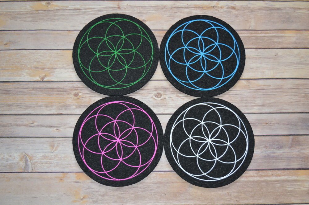 East Coasters Seed of Life 8" Dab Mat, unique design, heat-resistant, showcases sacred geometry, adding protection and aesthetic value to your setup, crafted for durability, heat-resistant and non-slip surface, perfect for dab rigs and glass pieces.