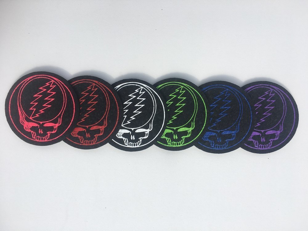 East Coasters Steal Your Face 8" Dab Mat, iconic Grateful Dead-inspired design, heat-resistant and non-slip, adds a classic touch to your setup, offers protection and unique style, perfect for glass rigs and accessories.