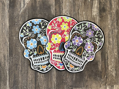  East Coasters Sugar Skull 10" Dab Mat, vibrant, heat-resistant, adds color and culture to your setup, bright sugar skull design, heat-resistant, non-slip mat, protects surfaces and complements any rig, ideal for those seeking a bold, functional piece.


