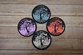 : East Coasters Tree of Life 5" Coaster, artistic and heat-resistant dab coaster, embodying symbolism, offering a meaningful and protective surface for your glass pieces, heat resistant and compact, a versatile addition to any dab setup.