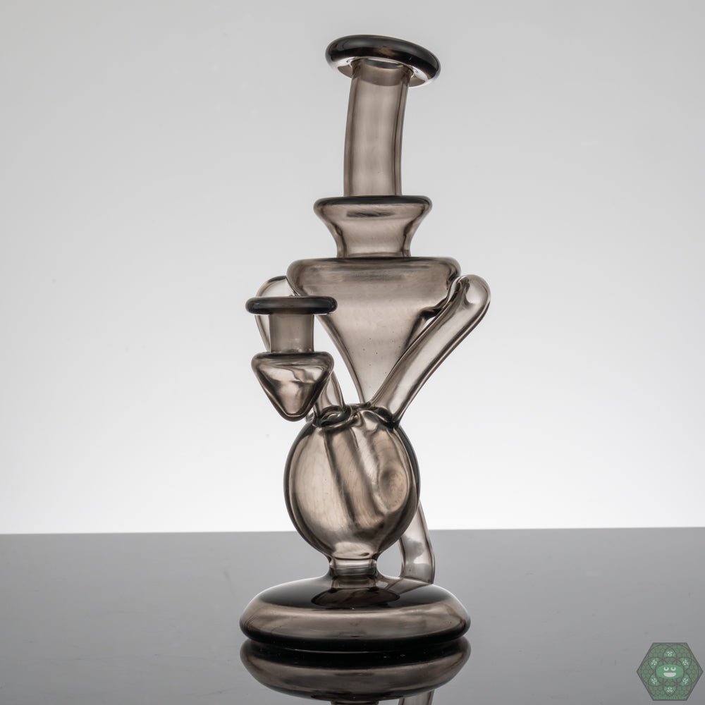 Elegant Dab Rig with 2-Hole Perc: The M Henny Smoke Recycler combines elegant design with a 2-hole percolator for enhanced filtration and a refined dabbing experience.